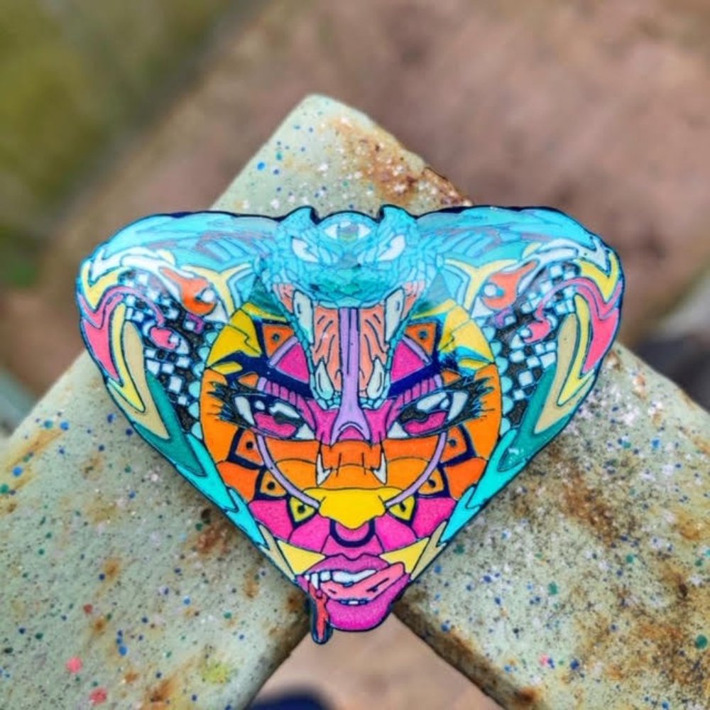 Snake Charmer lapel pin